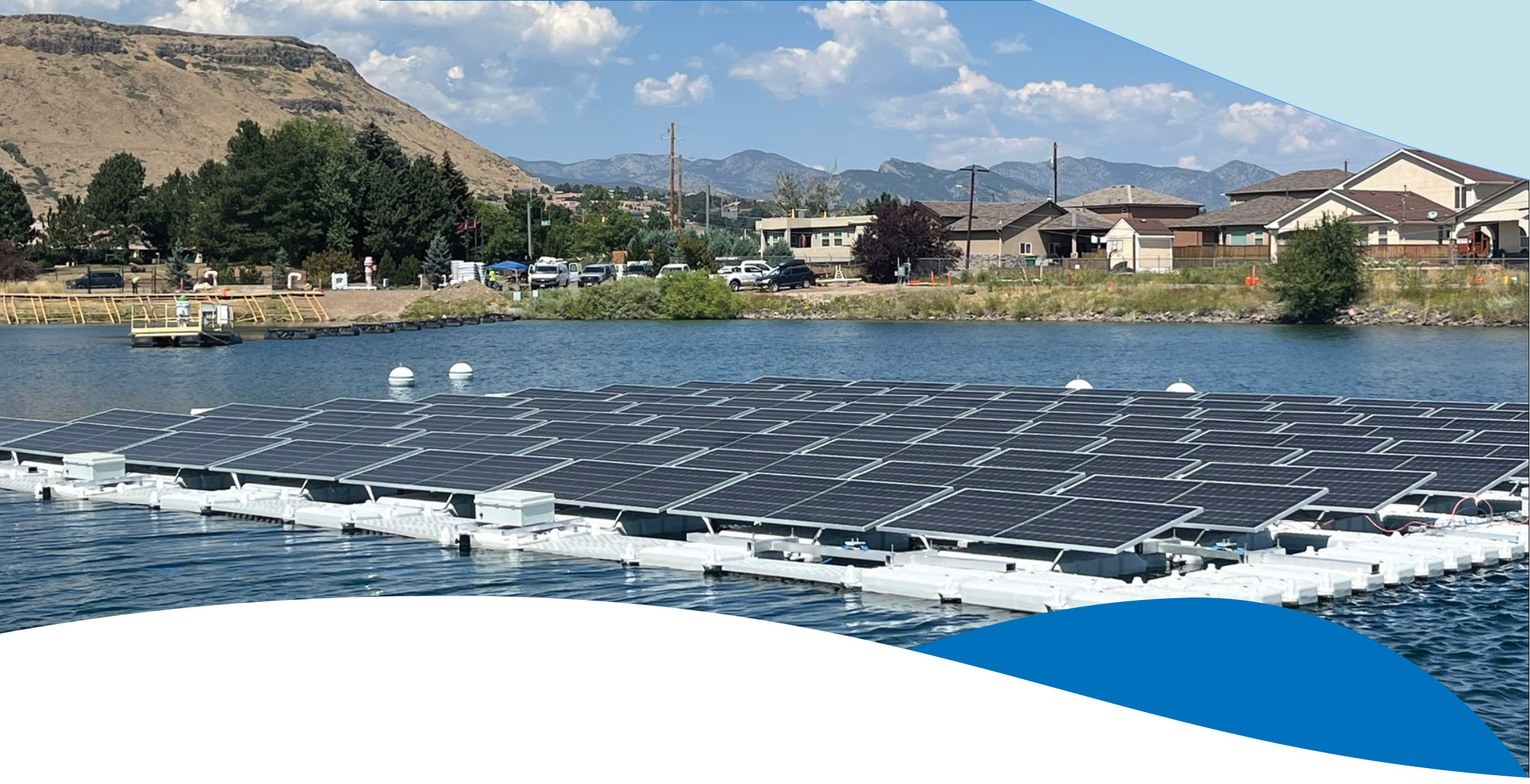Floating solar panels on Fairmount Reservoir with mountains in the background